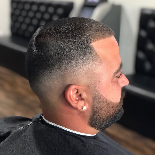 Skin fade and beard line-up