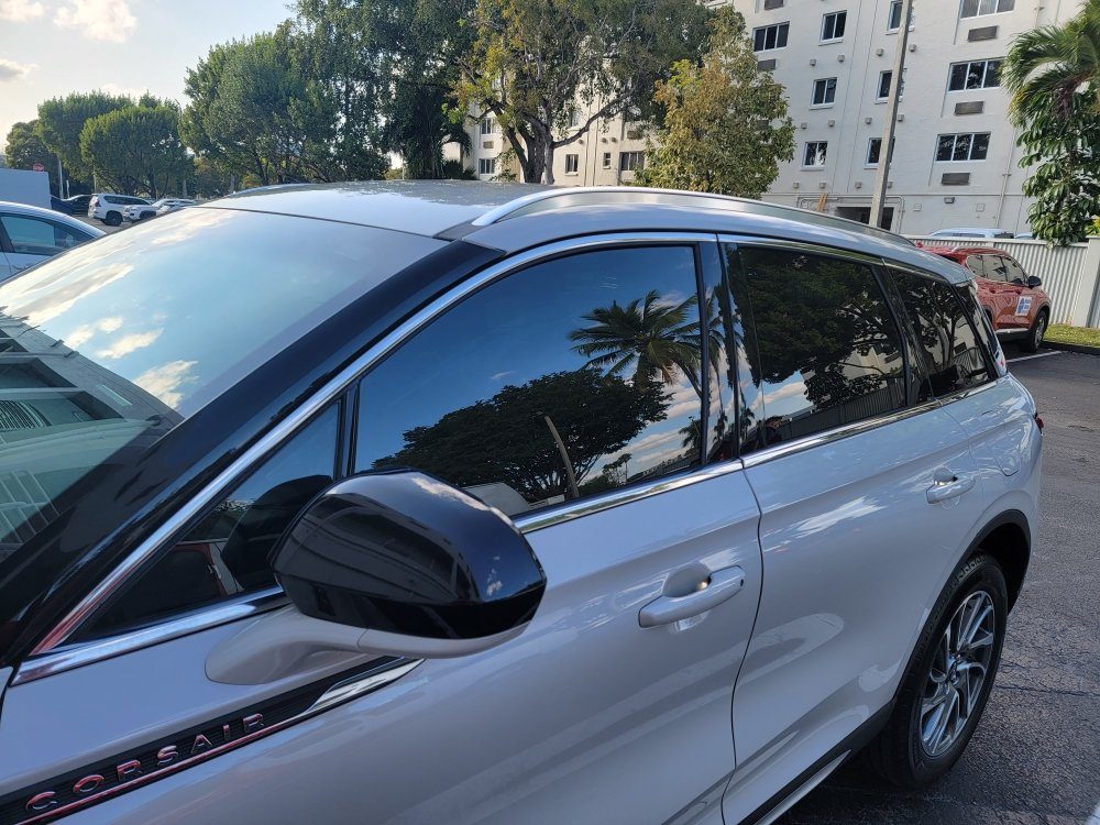 White crossover SUV with tint