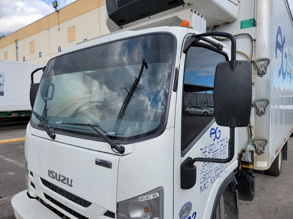 Isuzu box truck with freshly tinted cab windows
