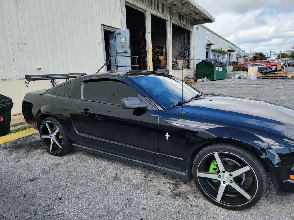 Black Mustang with dark tint