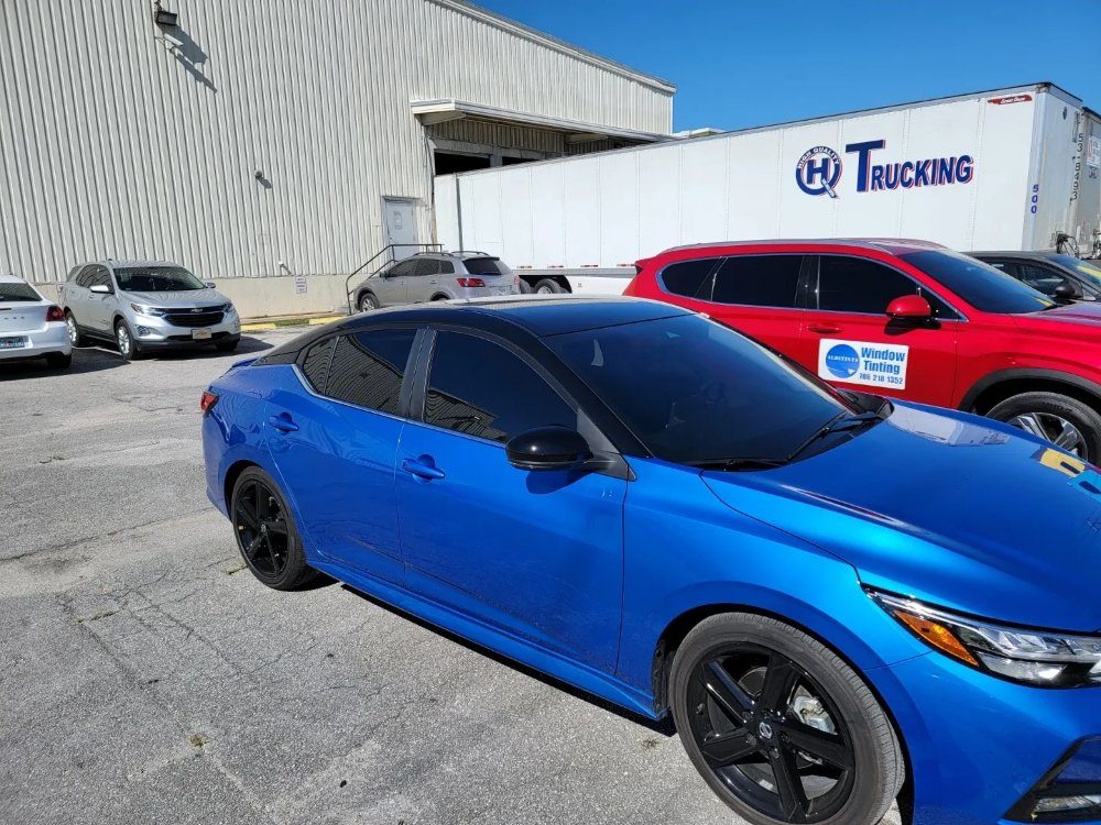 Blue Nissan Sentra side view