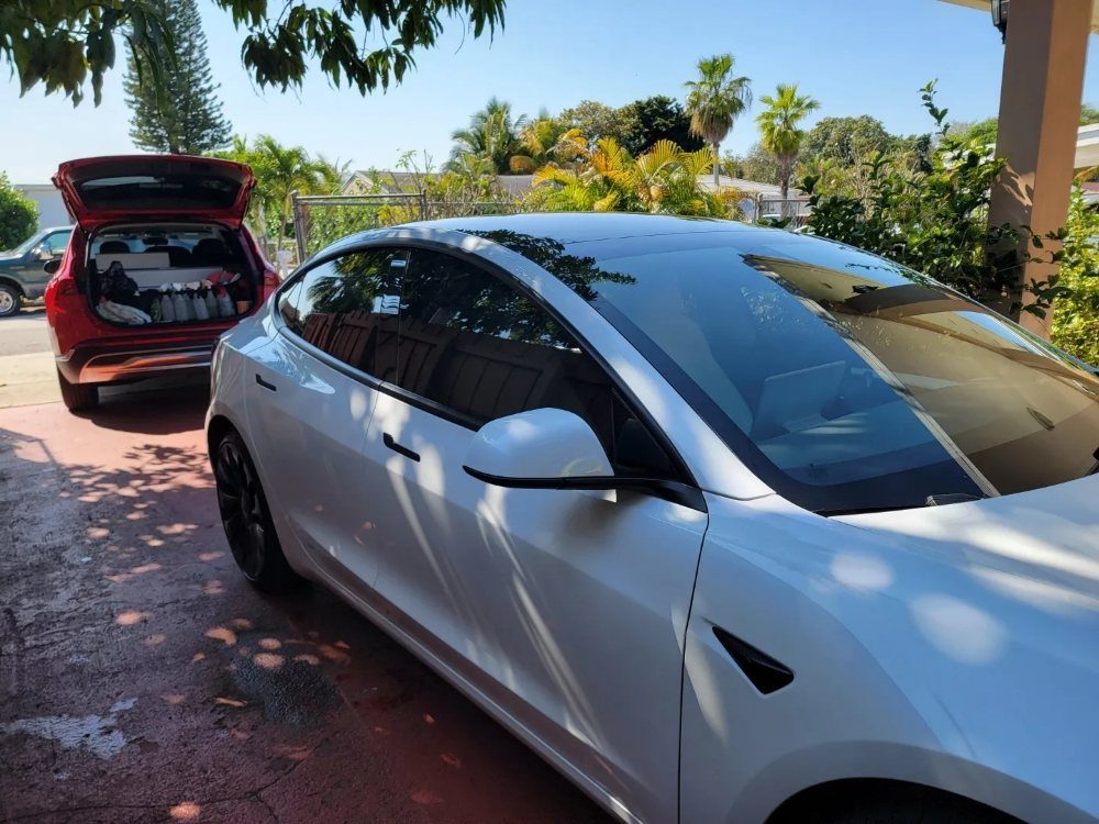 White Tesla Model 3 side windows tinted