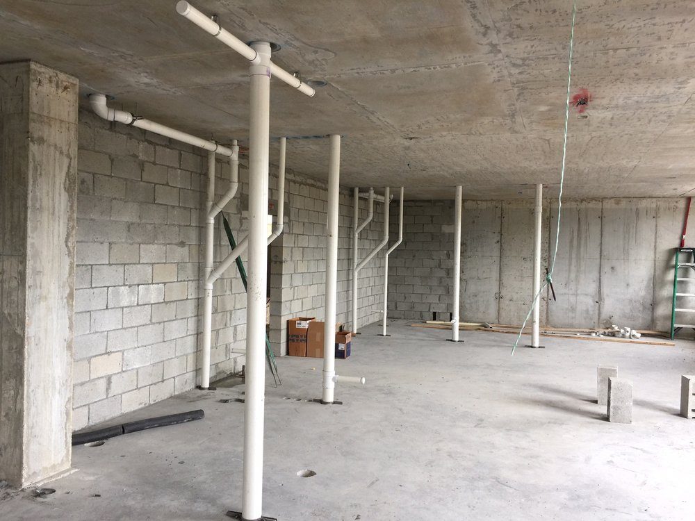 Commercial floor with new drain and vent stacks