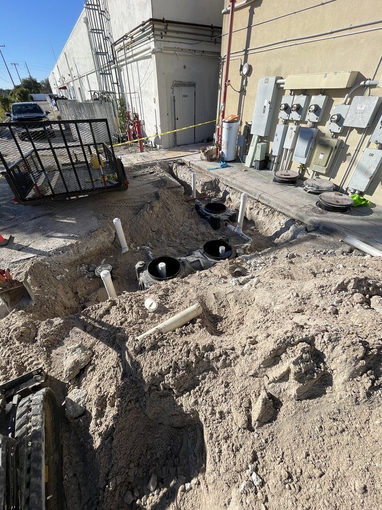 Grease trap installation in an open excavation