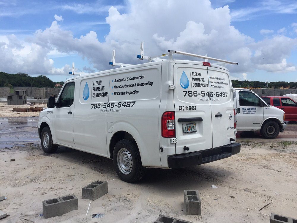 Alfaro Plumbing Contractor's white service van on a job site