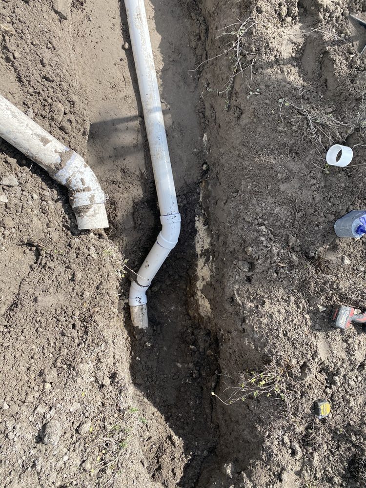 Sewer line repair in an open trench