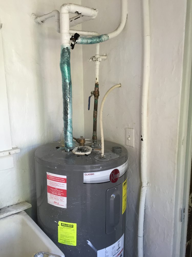 Electric water heater installed with new copper lines