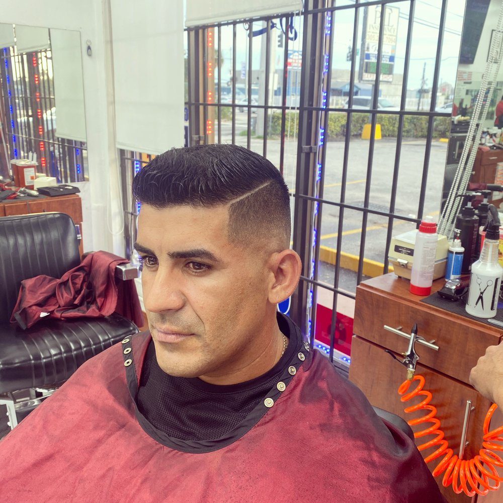 Skin fade with hard part, side view