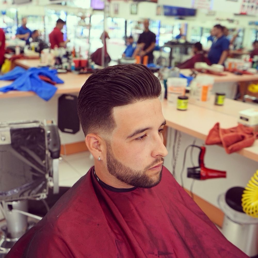Fresh skin fade and pompadour at Flores Brothers Barber Shop on Coral Way