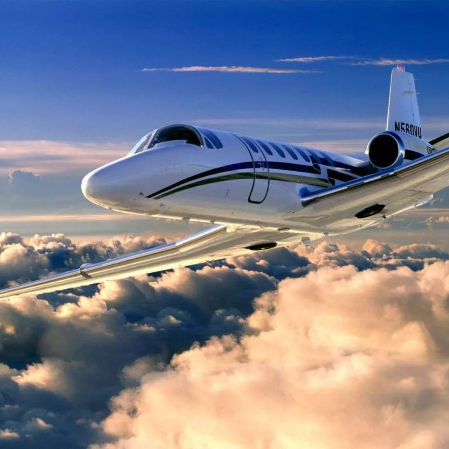 Citation jet above the clouds