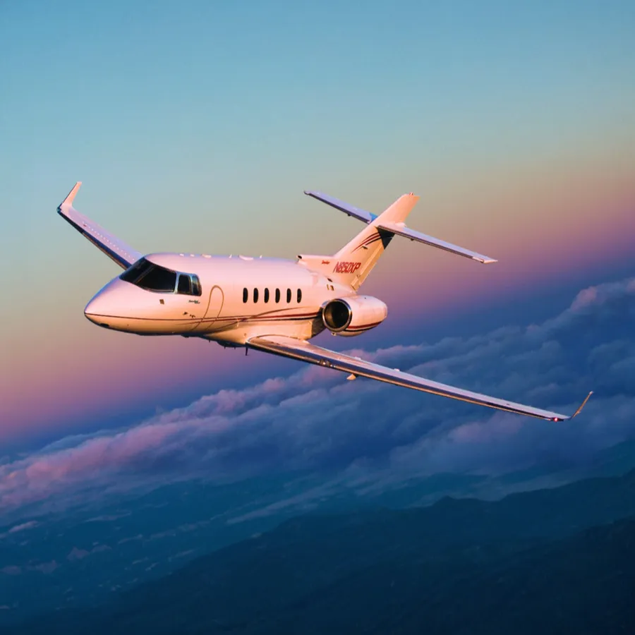 Hawker jet in flight at dusk