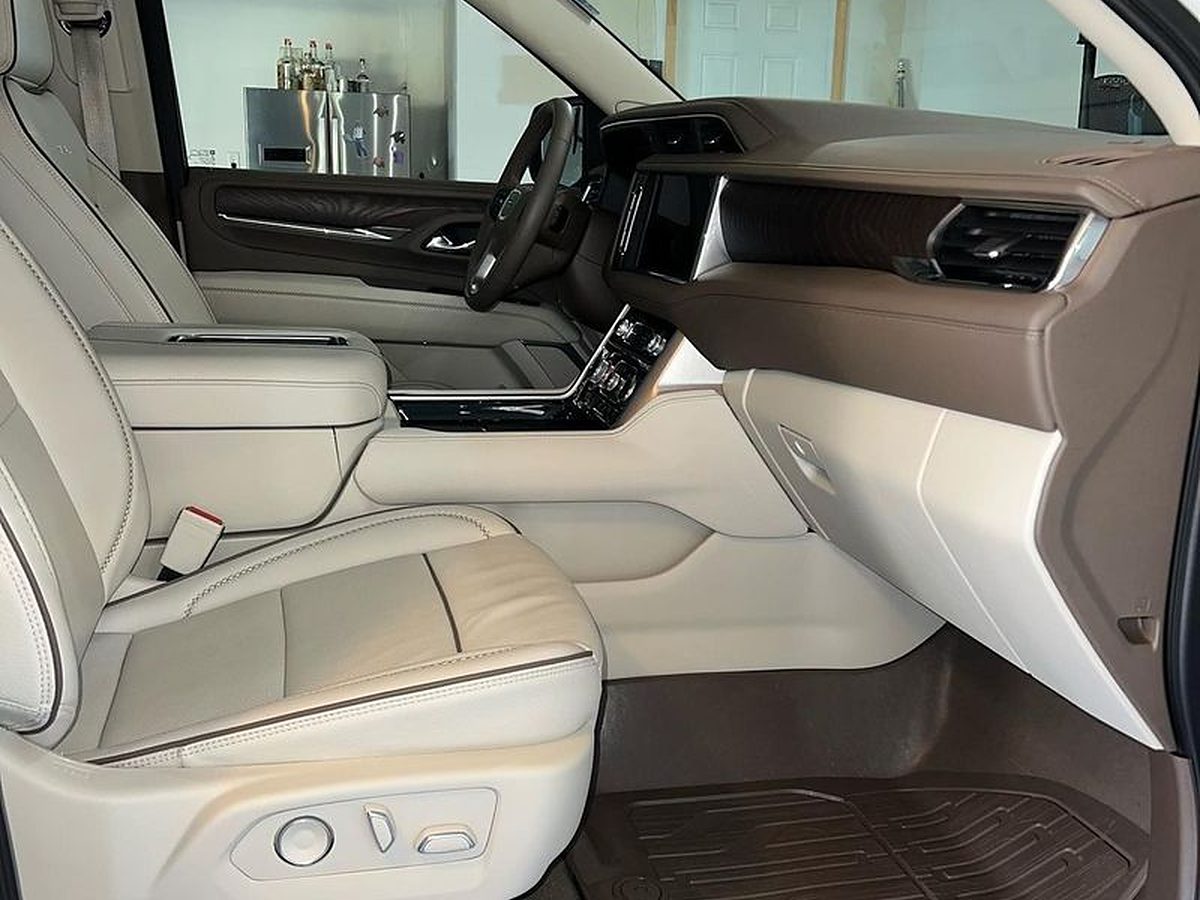 GMC Denali SUV interior detail: cream leather seats, dash and door panels cleaned and conditioned