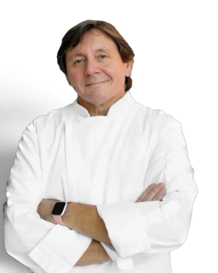 Portrait of Claudio Alicandri in chef whites
