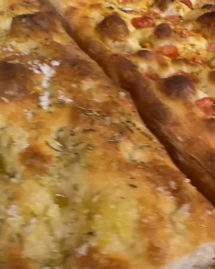 Cherry tomato focaccia with a golden, blistered crust