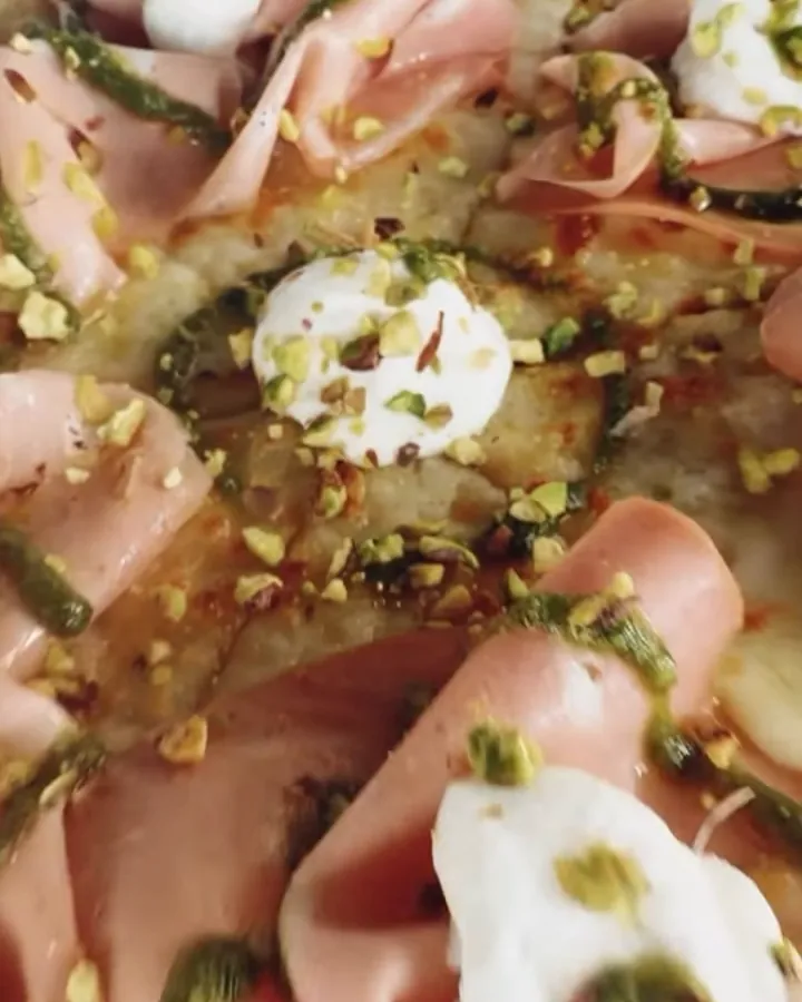 Pizza bianca with mortadella, ricotta and pistachio