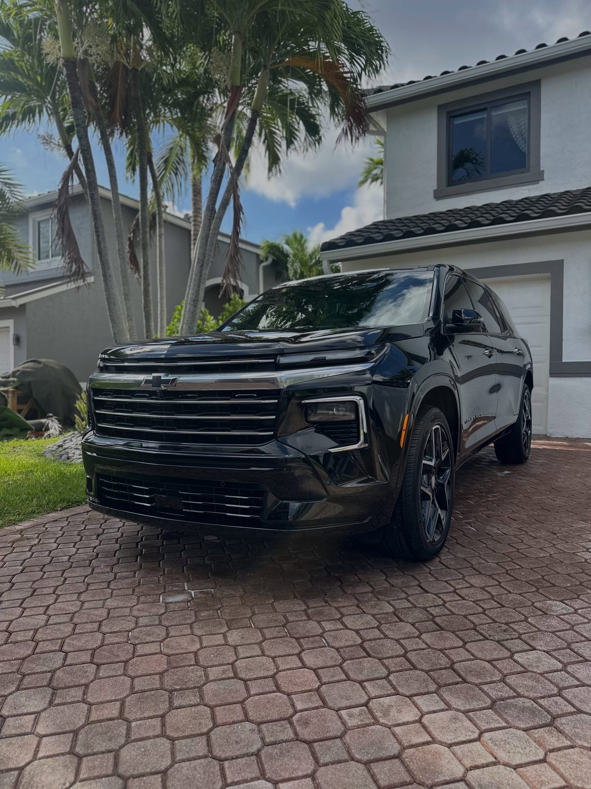 Black Chevy Tahoe washed in a Kendall driveway