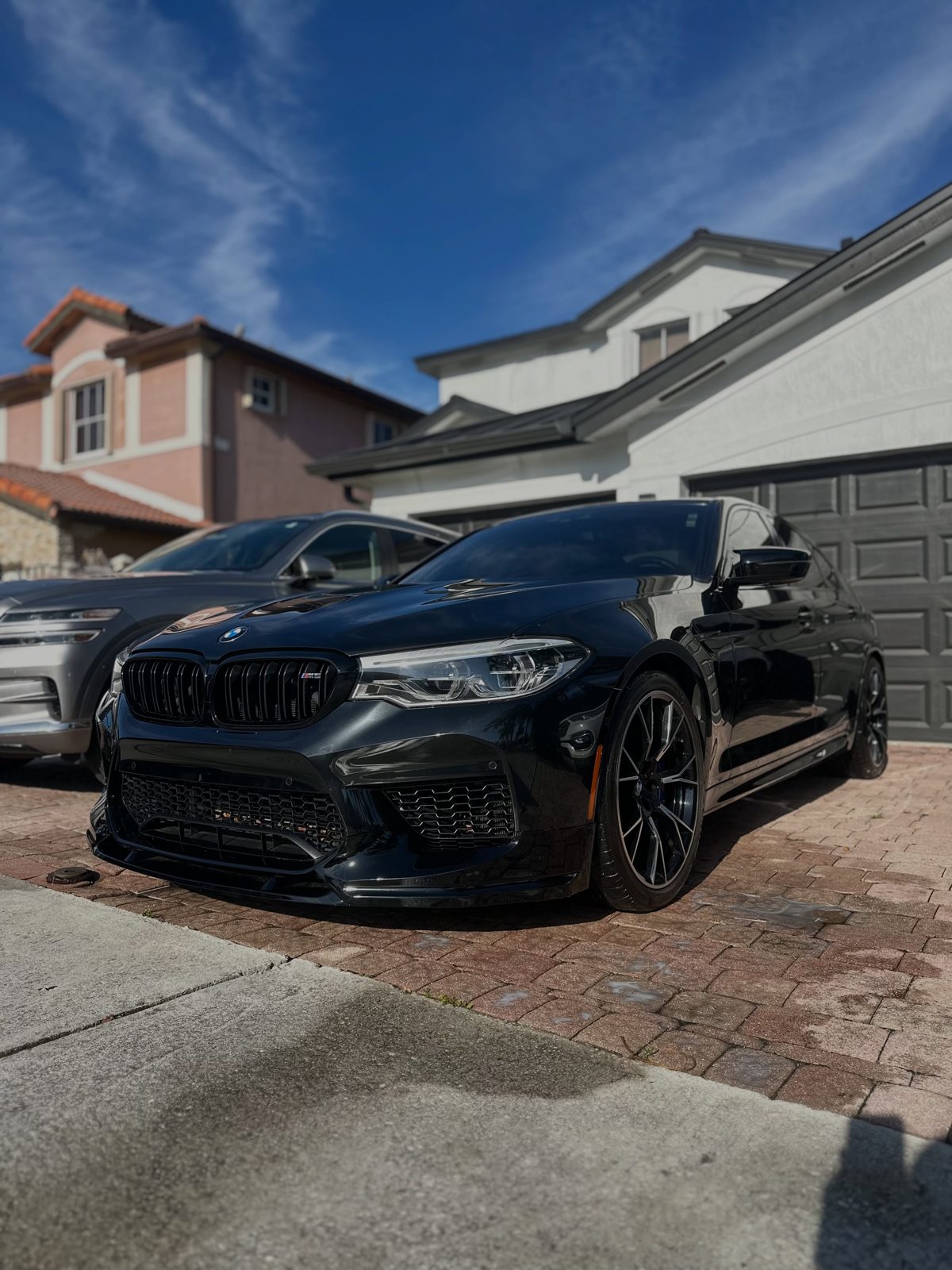 Black BMW M with a deep gloss after wash and wax