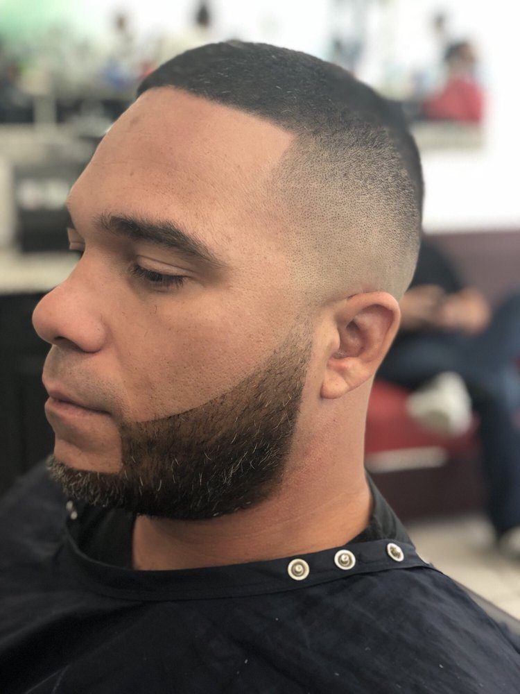 Lined-up beard and fade, side profile