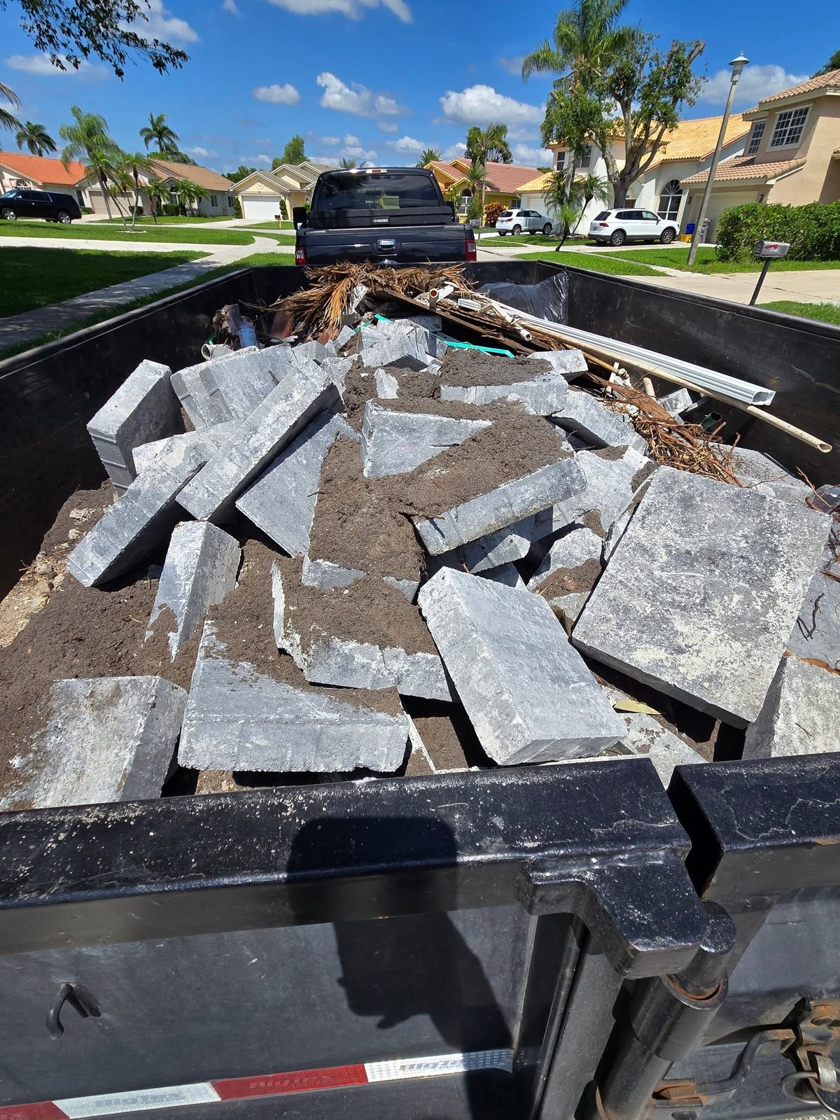 Dump trailer full of construction debris ready to haul