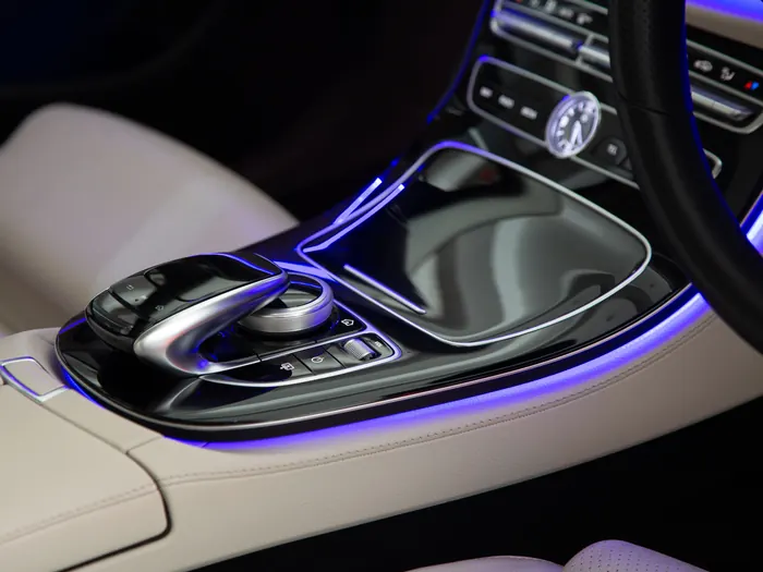 Center console with blue and purple accent lighting