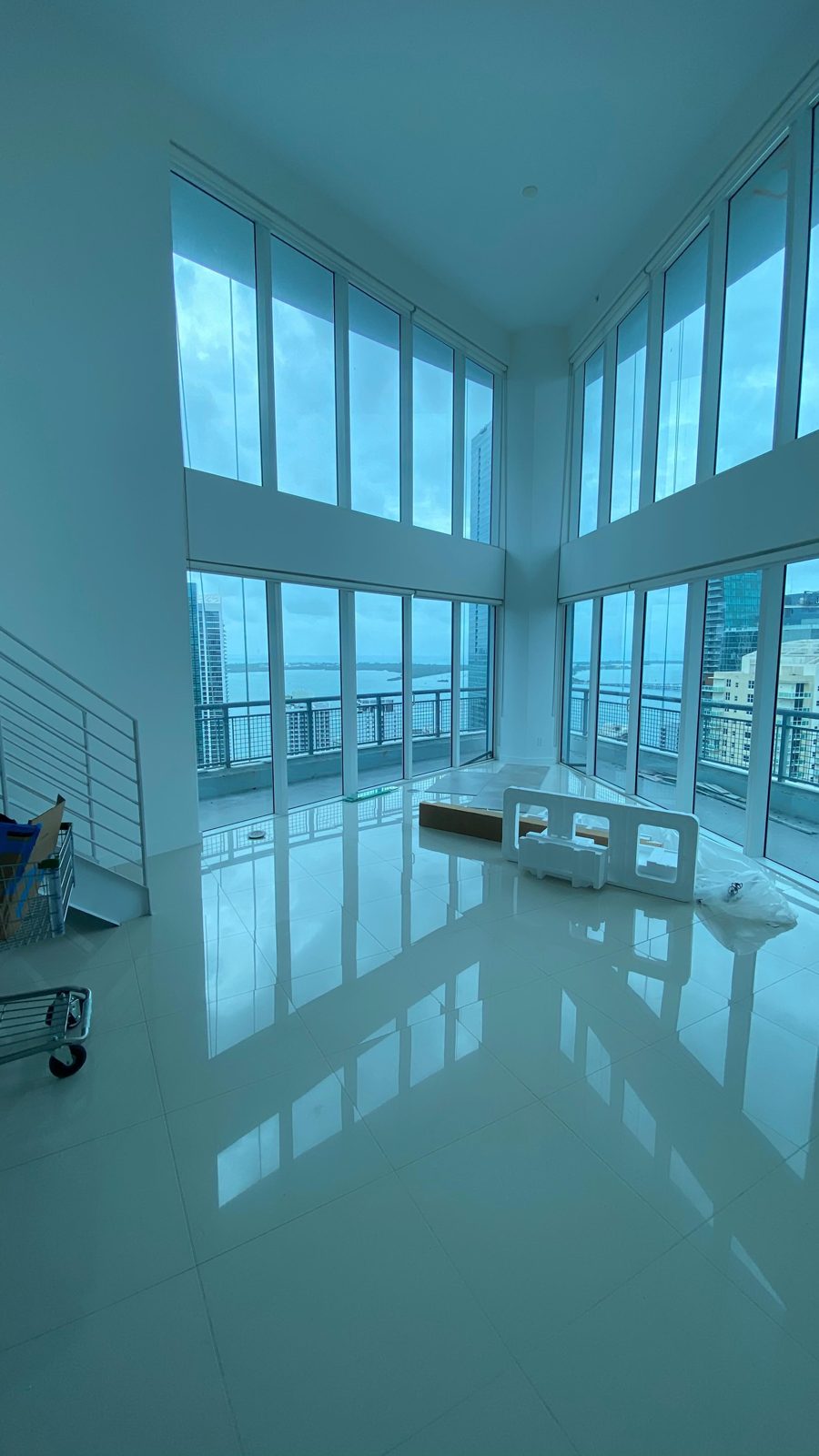 Large-format porcelain tile floor in a high-rise condo