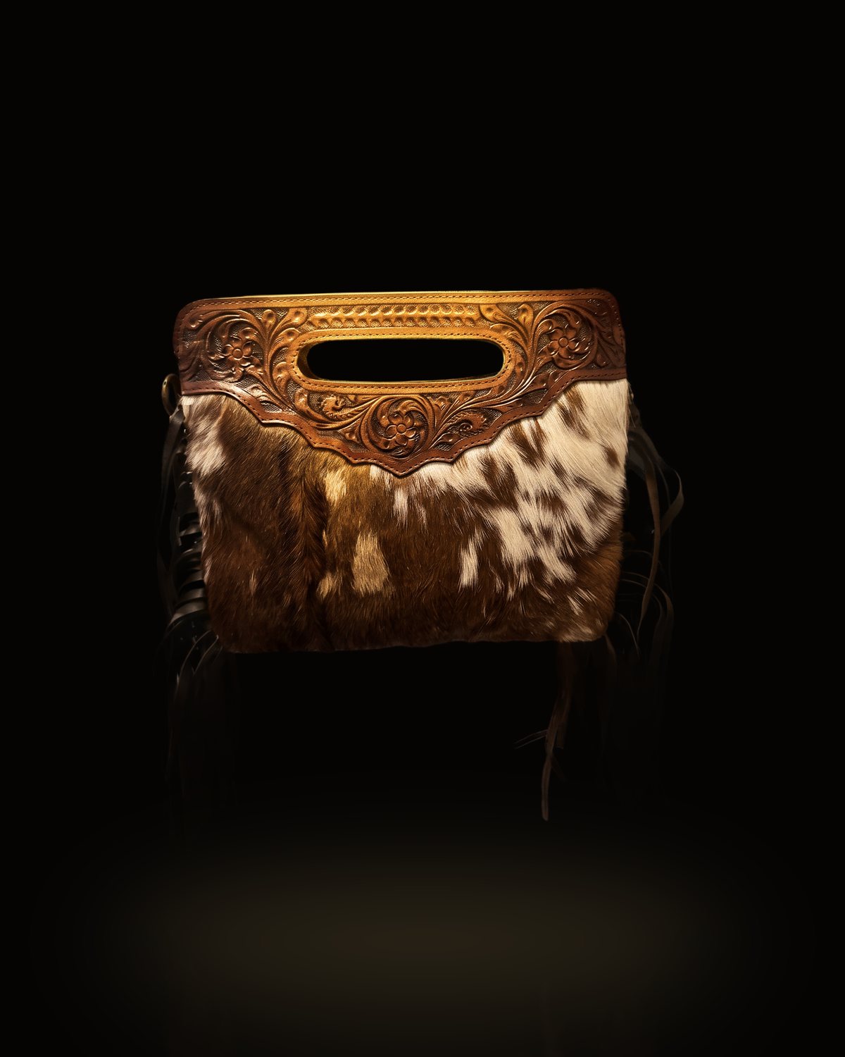 The Palomino Fringe Clutch — Hair-On Cowhide & Hand-Tooled Leather